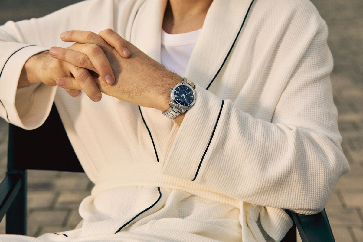 Man wearing a Tissot Gentleman with blue dial